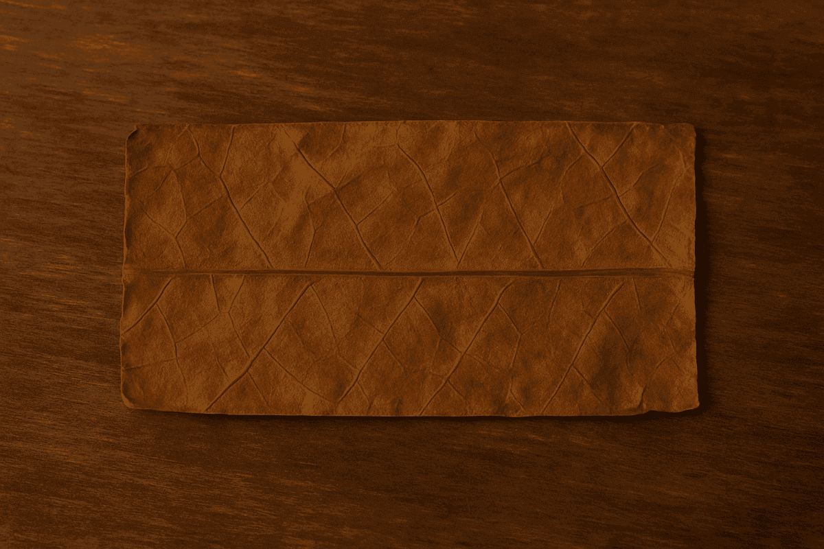 A perfectly rectangular hand-cut tobacco wrap